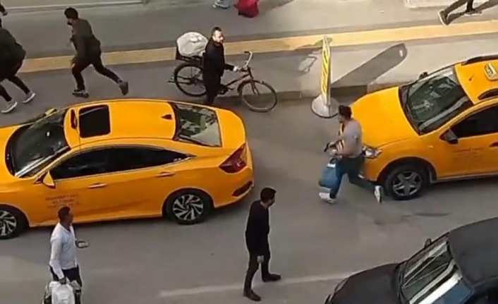 Tartıştığı sürücüyü silahla cadde ortasında kovaladı