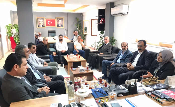 Orhan'dan Ak Parti yeni İlçe Başkanı Kuşan'a ziyaret