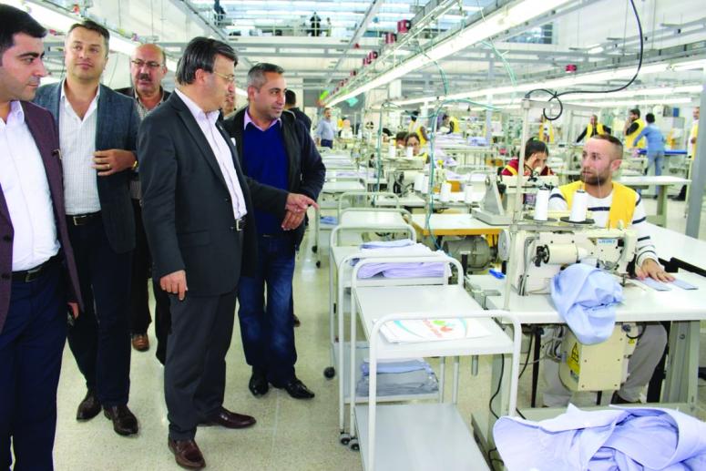 Türkmenoğlu'ndan, tekstil fabrikasına ziyaret...